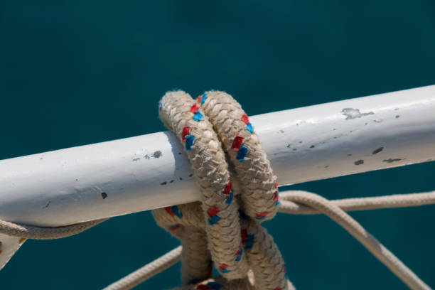 istock close-up nautical image, knotted rope, nickel-plated handrail 1356789175
