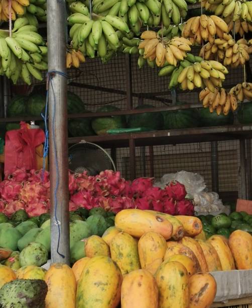 istock Fruit shops that offer fresh fruit, including bananas, papayas, watermelons, avocado, etc 1356793751