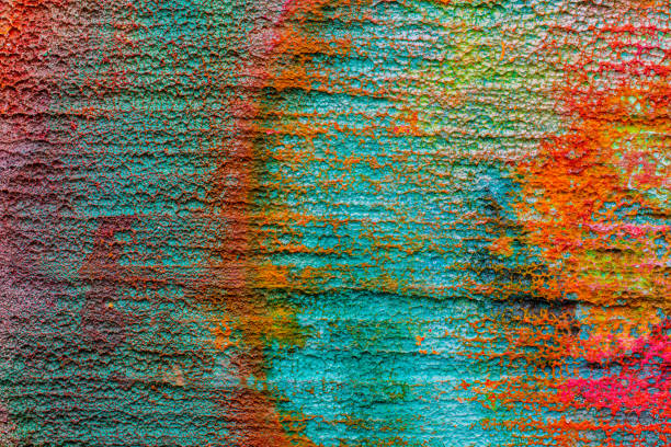 istock Oxidized copper, abstraction.  Natural orange, blue. green yellow background with patina rusty copper plate 1356795152