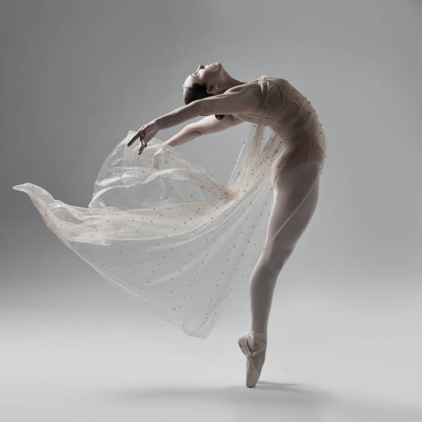 istock Full of a beautiful young ballet dancer rehearsing in a dance studio 1356795427