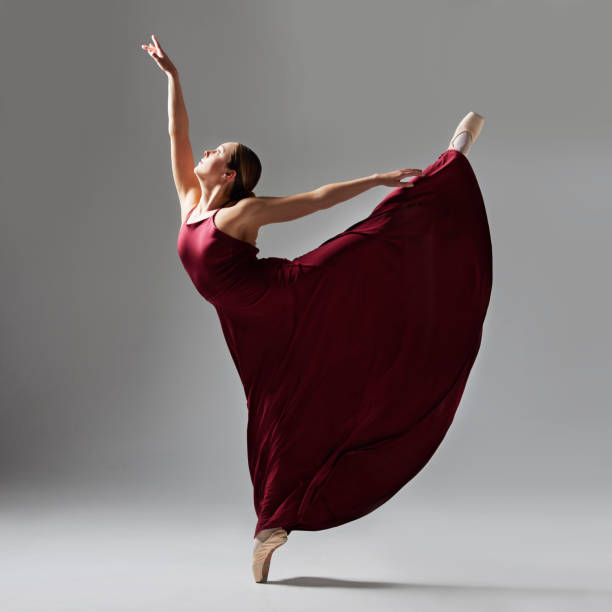 istock Full of a beautiful young ballet dancer rehearsing in a dance studio 1356795430