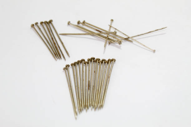 istock Metal pins with white background 1356798469