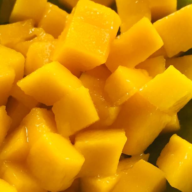 istock Close up Slice of fresh and delicious ripe mango. 1356798559