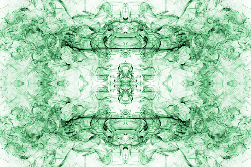 Symmetrical Green Smoke Pattern On A White Background
