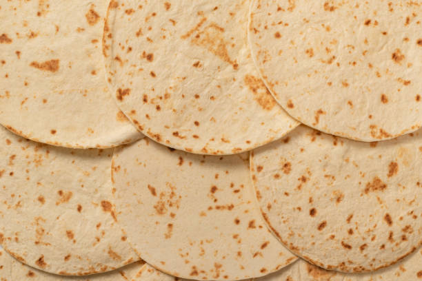 istock Grilled pitta bread isolated on white background. 1356800449