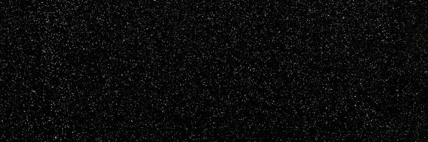 istock Black and white sparkling glitter bokeh background banner 1356801325