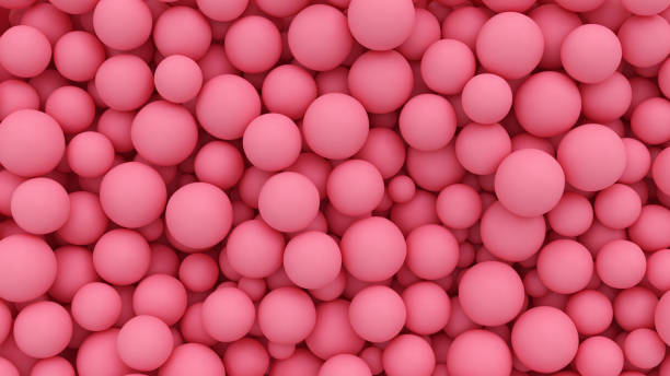 istock Abstract background with pile of many pink balls. 3D rendered image. 1356806013