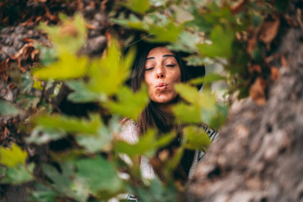 Cute Woman Blowing a Kiss