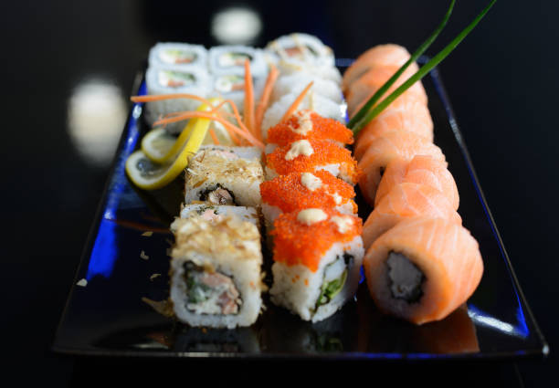 istock Japanese sushi on a black plate. 1356806351
