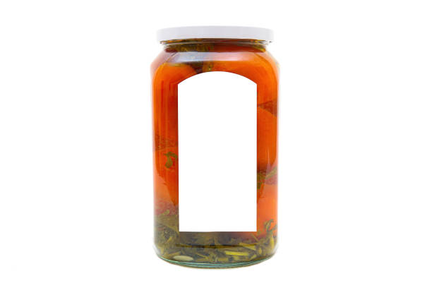 istock Salted tomatoes in a glass jar 1356808886