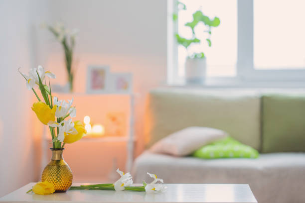istock white home interior with spring flowers and decorations 1356811157