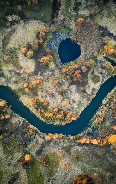 istock Yellow forest in autumn and blue river, view from above. Smile 1356811223