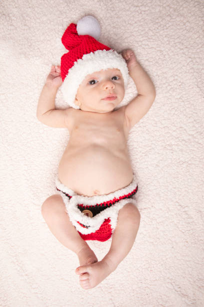 istock 3 Month Old Santa Baby Boy 1356811855