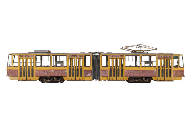 istock Old abandoned red-yellow tram Tatra KT4, isolated on white. 1356818531