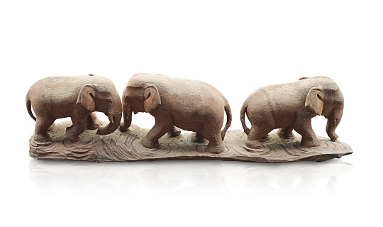 side view beautiful wooden  three elephants on wooden stand on white background, animal, object, decoration, copy space