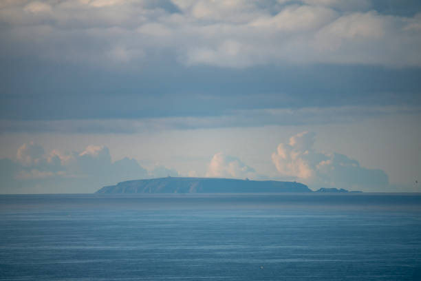 Lundy island in the haze off the Cornish coast.