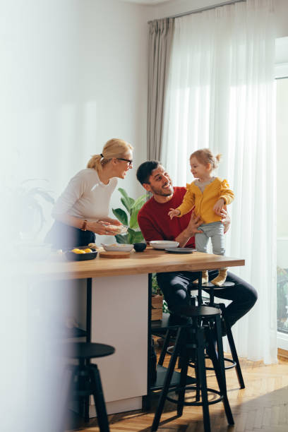 istock Family Having a Healthy Breakfast in the Kitchen 1356820138
