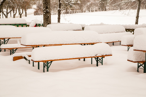 The snow-covered beer garden has a winter break