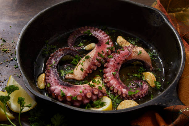 istock Pan Seared Octopus in Garlic and Lemon Infused Olive Oil 1356820427