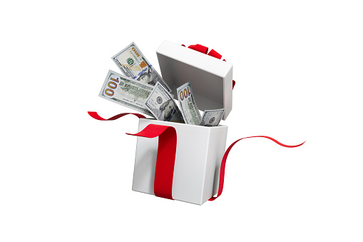 Christmas gift on white background with 100 dollar bills flying out of the the gift box with clipping path.