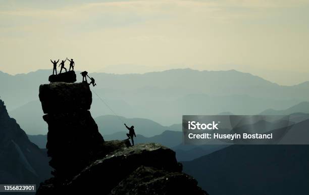 Amazing Mountains Climbing In Mystical Areas Adventure Discovery And Success Stories Stock Photo - Download Image Now