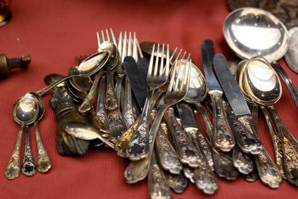 istock Metal forks and knives on the red table 1356824815