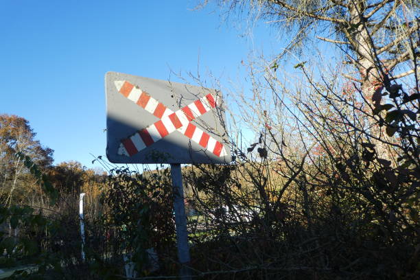 railway line signaling, cross of saint andre barrier-free railway road sign, infrequent passage railway signal stock pictures, royalty-free photos & images