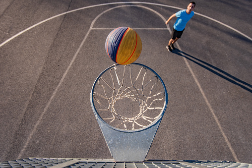 Basketball Player Taking A Shot With Ball Stock Photo - Download Image