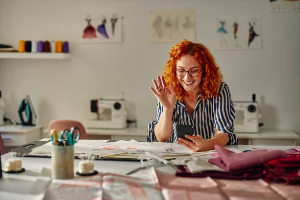 istock Woman having video call in her atelier 1356830090