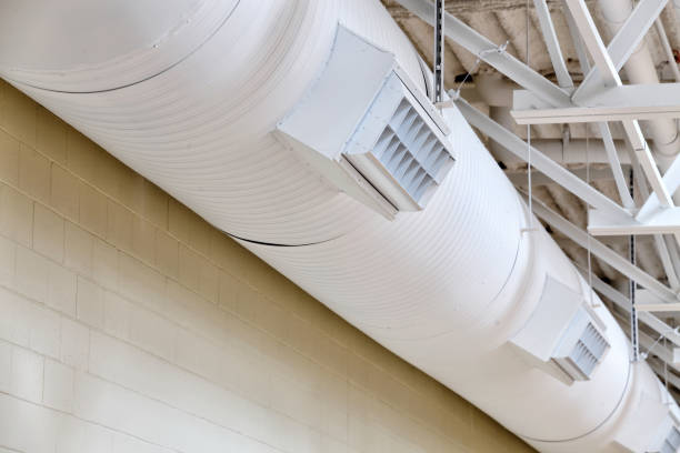istock Exposed duct work in a modern school building. 1356831740