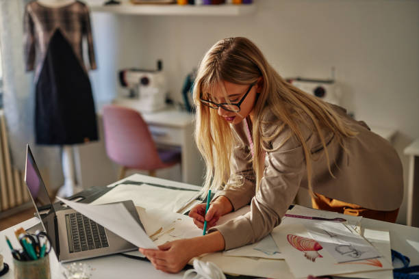 istock Fashion designer drawing a concept 1356831829