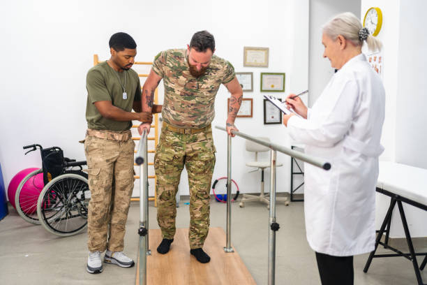 istock young military soldier uses parallel bars in a rehab center. 1356832171