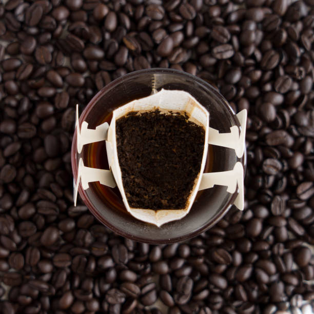 istock coffee beans and coffee filters 1356836235