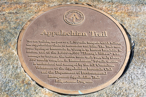 Mount Greylock, Massachusetts, USA - September 15, 2016. Appalachian Trail marker on the Mount Greylock summit. Text: 