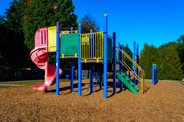 istock frontal view of a playground structure in a public park 1356840418