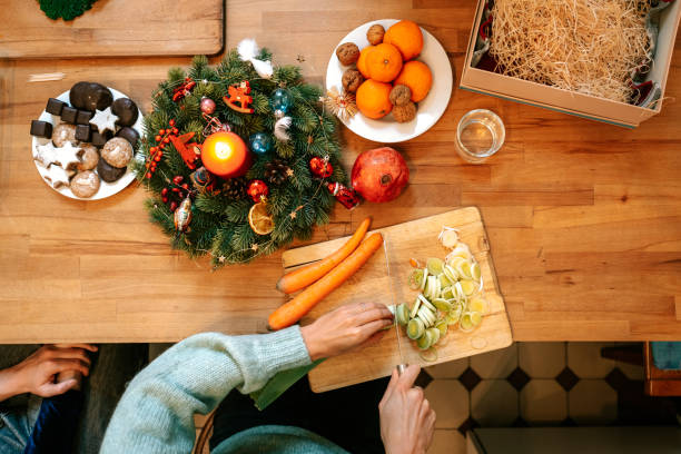 istock Woman preparing vegetarian christmas meal on kitchen table 1356840703