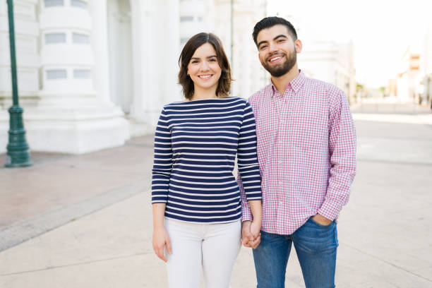 istock Happy boyfriend and girlfriend enjoying a date 1356841733