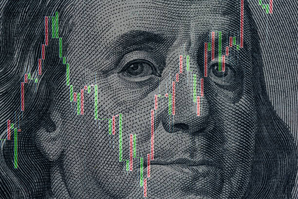 istock Stock quotes graphs and American dollar bill 1356844166