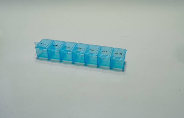 istock blue pill box for weekly medicine 1356854558