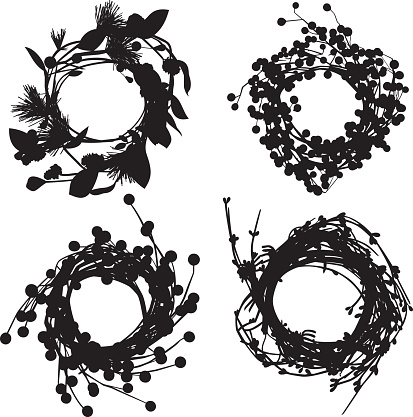 Vector silhouettes of a group of four wreaths.