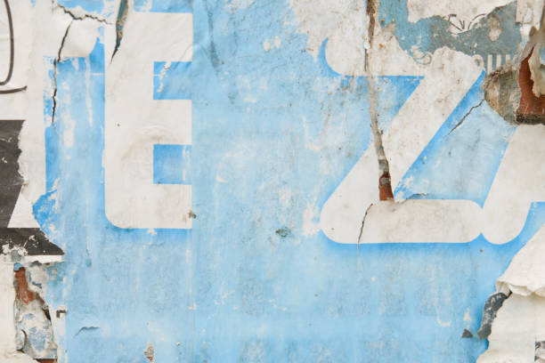 istock Weathered and ripped street poster background 1356862759
