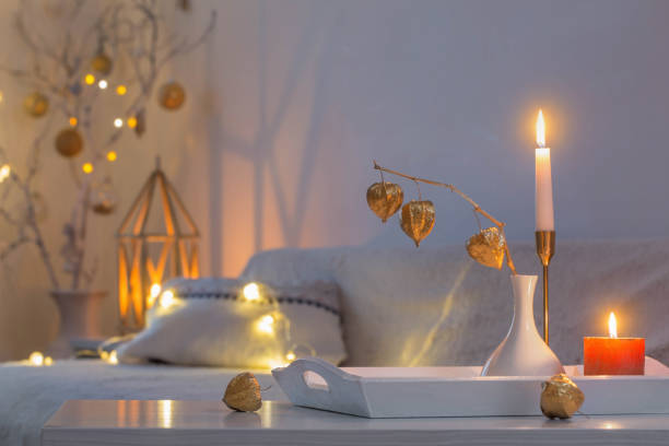 istock christmas home decorations with candles in white interior 1356864675