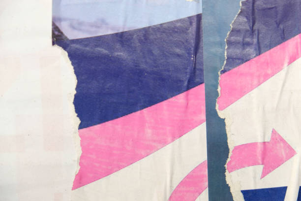 istock Weathered and torn street poster background 1356865558