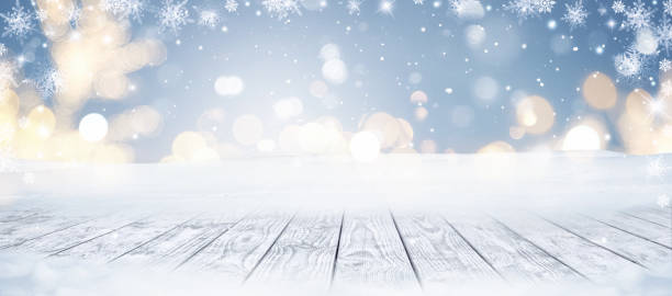 istock Winter Christmas scenic background with wooden table and copy space. 1356872096