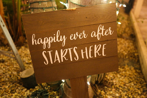 Wedding sign that reads Happily Ever After Starts Here