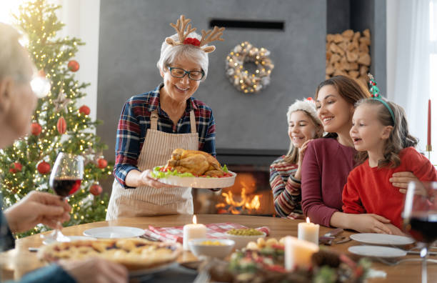istock family celebrating Christmas 1356885248