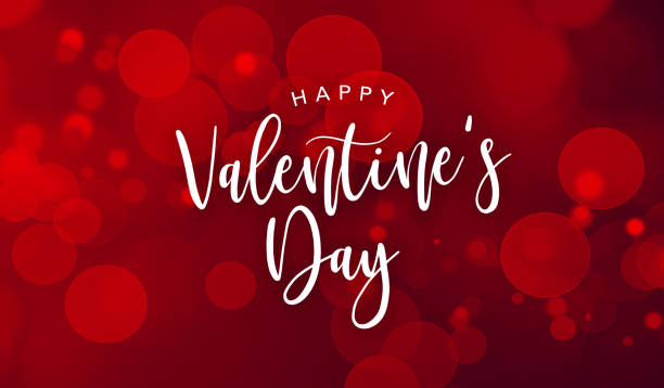 istock Happy Valentine's Day Celebration Text Over Red Bokeh Lights Background 1356886007