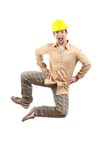 Architect jumping in excitement stock photo