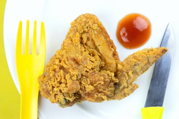 istock Fried Chicken wing and Ketchup on white plate. 1356908615