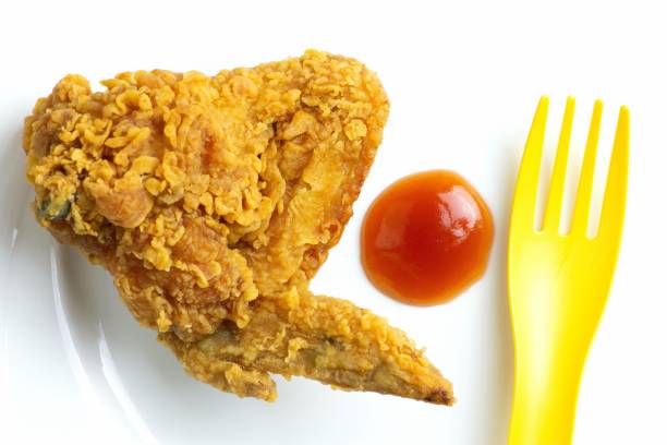 istock Fried Chicken wing and Ketchup on white plate. 1356908628